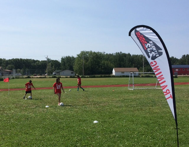 Youth soccer players in action — KidSport community program